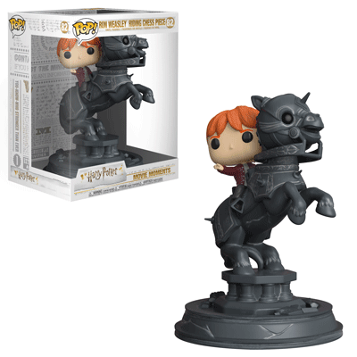 Funko Pop! Harry Potter Ron Weasley riding a chess piece figure from Shak's Pop Shop, featuring Ron in wizard robes on a chess set.