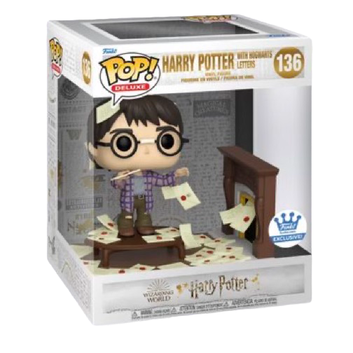 Funko Pop! Deluxe Harry Potter figure with Hogwarts letters, featuring detailed wizard outfit and accessories, from Shak's Pop Shop.