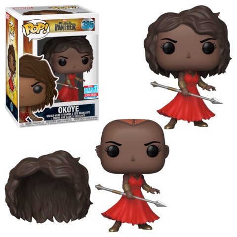 Funko Pop! of Marvel's Okoye in a red dress from Black Panther, displayed on a NYCC 2018 shared sticker.