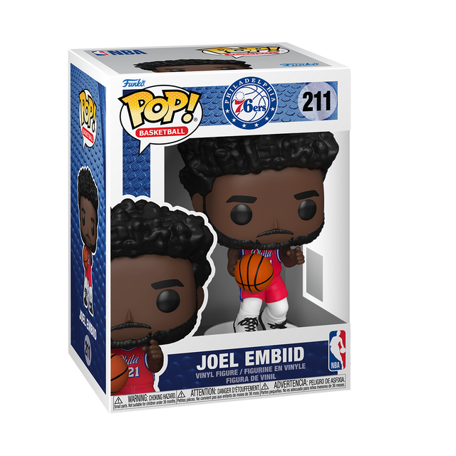 
A Funko Pop! NBA Basketball figure of Joel Embiid, with dark curly hair and a beard, wearing a red Philadelphia 76ers uniform with the number 21, holding a basketball. The box is white and blue.