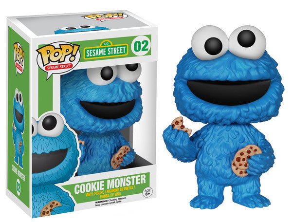Funko Pop! figure of Cookie Monster from Sesame Street, collectible vinyl toy by Shak's Pop Shop, featuring Cookie Monster with cookies.
